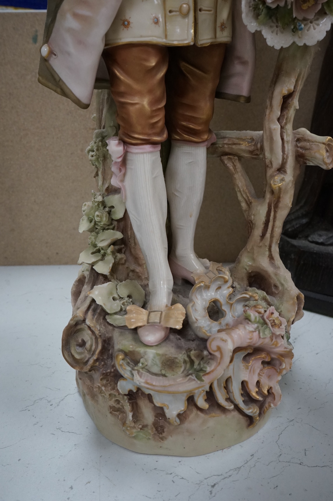 A large Royal Dux figure of a gent, 60cm